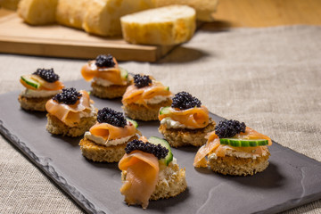 Smoked Salmon Canapes with Sour Cream and Caviar