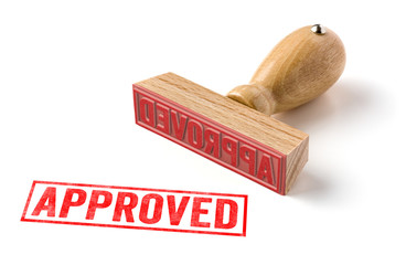 A rubber stamp on a white background - Approved