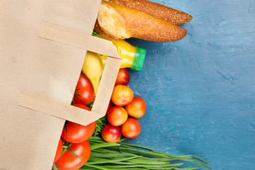 Full paper bag with different food