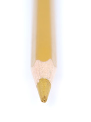 beige pencil on a white background
