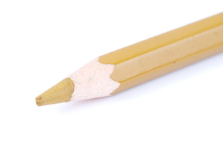 beige pencil on a white background