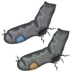 Old pair of holed socks with patches
