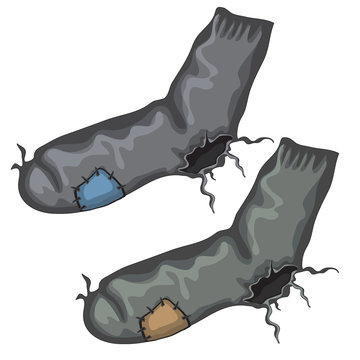 Old pair of holed socks with patches