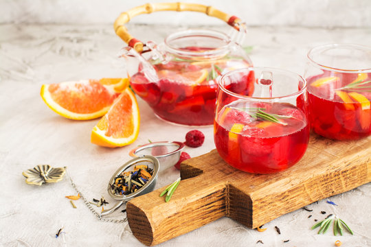 Fruit and berry tea in a glass pot