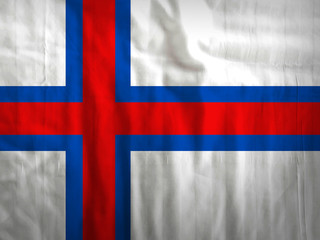 Naklejka premium Fabric Faroe Islands flag background