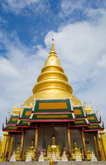 Fototapeta premium golden pagoda with buddha statues at lamphun,thailand