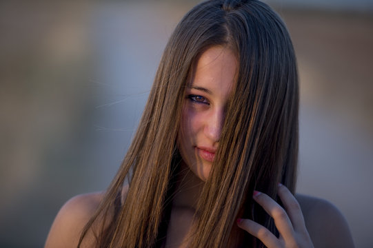 Cute Teenager Having Fun Alone at Sunset