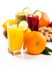 Fresh fruits and juice isolated on white background
