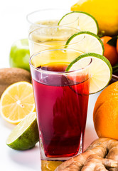 Fresh fruits and juice isolated on white background