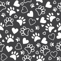 Seamless pattern with paw and heart prints. Cute animal footprin