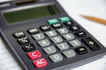 calculator on white paperwork