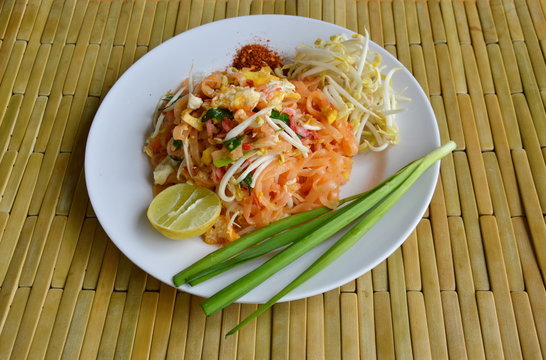Pad Thai stir fried thin noodle with egg and vegetable on dish