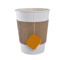 Paper cup of tea with tea bag (blank label) isolated on white background