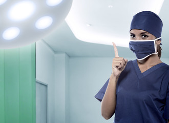 Asian female doctor pointing her hand