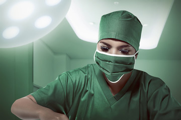 Fototapeta na wymiar Asian female doctor doing surgery