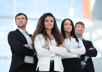 Group of successful business people looking confident