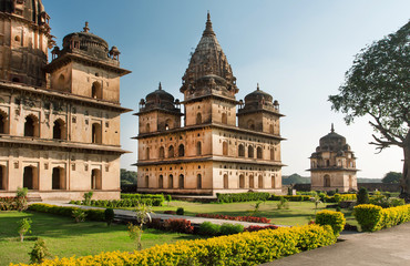 Fototapeta na wymiar Old structures with stone domes in indian Orchha. Cinotaphs was built in 17th century in India
