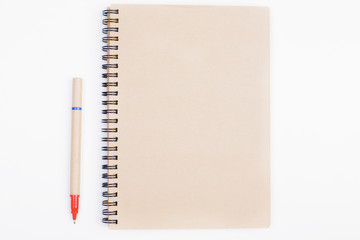 White desk with blank notepad