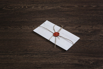 Letter with seal on table