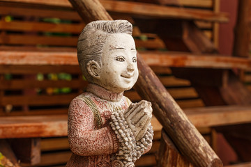 Ceramic dolls in garden thailand