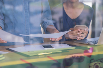 closeup female hands and business document with diagram
