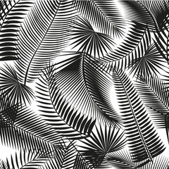 Beautiful black seamless tropical jungle floral pattern background with palm leaves. Vector illustration.