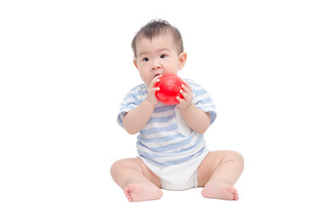 Little asian girl playing ball over white background