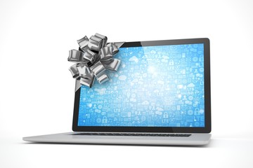 Tied laptop with silver bow on white background. Modern present or gift for birthday, holiday, christmas. 3D rendering.