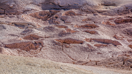 Close-up of dried and cracked red clay. Fountain Paint Pots. Yellowstone National Park, Wyoming