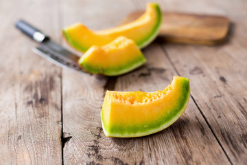 honeydew melon on a wooden table background