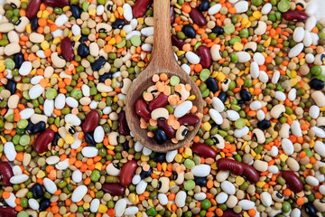 Wooden spoon and mixed legumes