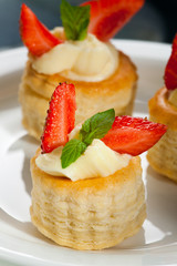 pastry with vanilla cream and strawberries