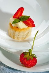 pastry with vanilla cream and strawberries