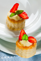pastry with vanilla cream and strawberries