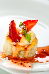 pastry with vanilla cream and strawberries