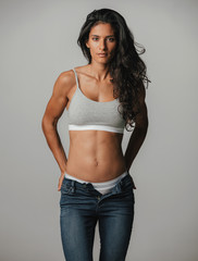 Obraz premium Gorgeous woman with unzipped pants