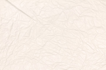Recycled crumpled light brown paper texture or paper background for design with copy space for text or image.