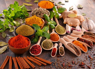 Fototapeta na wymiar Variety of spices on kitchen table