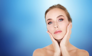 Fototapeta premium beautiful young woman face and hands