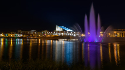 Fototapeta na wymiar Galiaskar Kamal Tatar Academic Theatre and fountain view in Kazan city