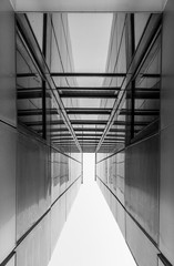 Urban Geometry, looking up to glass building. Modern architecture, glass and steel. Abstract architectural design. Inspirational, artistic image. Industrial design. .Modern building. Black and white. - 117830786