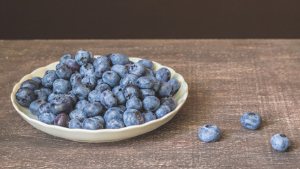 Blueberries on wooden background