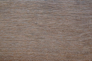 Detail surface of grunge brown wood with edge of plank, backgrou