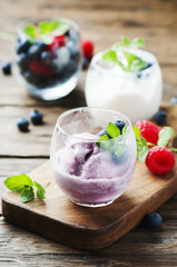 Ice cream with fresh berry and mint