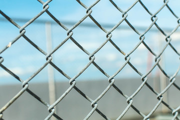 Fototapeta premium fence with metal grid in perspective