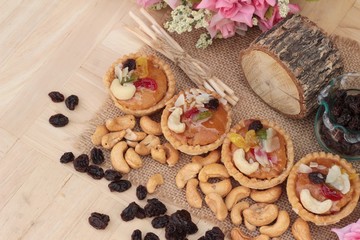 Fototapeta na wymiar Mini almond nuts,fruit tart is delicious.