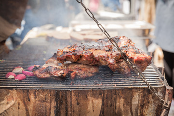 browning juicy pork on the grill ready to serve