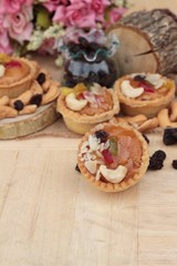 Obraz na płótnie Canvas Mini almond nuts,fruit tart is delicious.