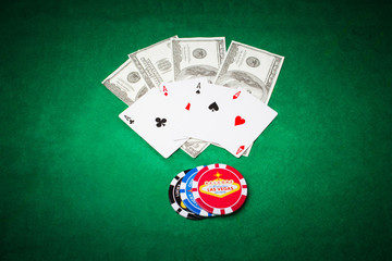 Poker cloth, a deck of cards and chips