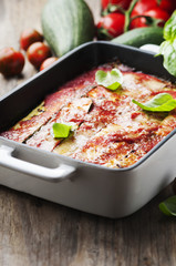 Italian traditional parmigiana with zucchini